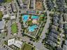 Community pool complex surrounded by walkable neighborhood streets in Lake Nona.