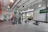 Community fitness center with strength training equipment and modern design.