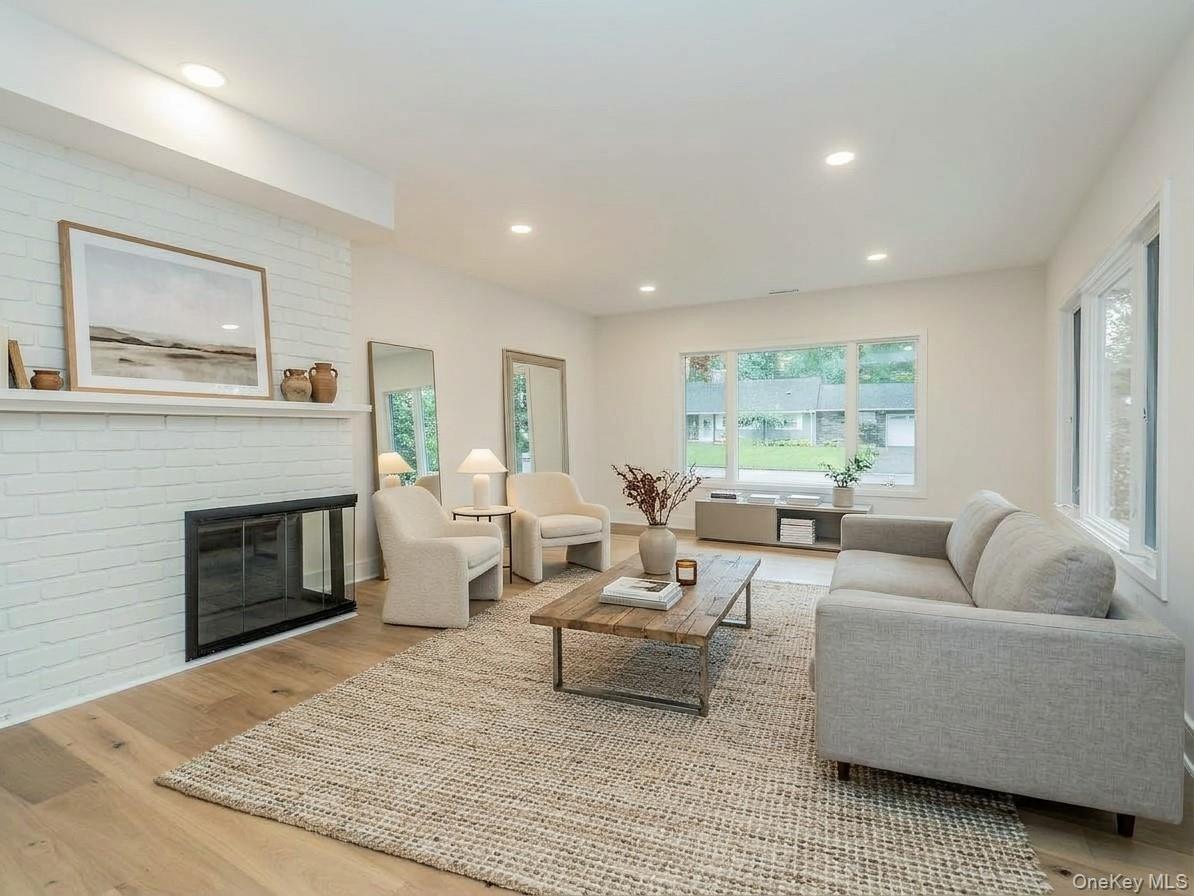 AI GENERATED: An idea of what the living room could feel like with furniture.