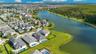 Aerial view of Laureate Park, one of Lake Nona's most sought after communities, with lakes, trails, and parks.