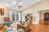 This unique upstairs bonus living space in Caya Costa features vaulted ceilings and premium hardwood flooring. The room offers expansive views of the 