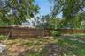 Wooden Fence with gate on Olcott Drive