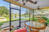 This covered, screened patio provides an ideal setting for enjoying scenic lake views and local wildlife, whether you are relaxing with a beverage or 