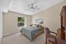 Guest room has an overhead fan