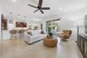 FAMILY ROOM WITH NEW SLIDING DOORS WITH MOTORIZED BLINDS