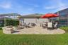 PAVER PATIO WITH BUILT IN SEATING AND FIRE PIT