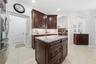 LAUNDRY ROOM WITH POCKET DOOR FOR SEPARATION