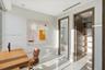 Polished stone flooring, recessed lighting, neutral wall finishes, custom walk-in closet shelving, and integrated climate control ductwork