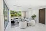 Floor-to-ceiling windows, polished stone flooring, recessed ceiling lighting, and a dark-finish interior door