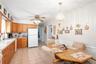 Tile floors, wood cabinets