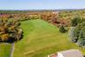 Aerial view of back yard - the property line is in the middle of the lawn where the mow pattern changes