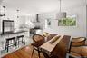 Dining area opens to Kitchen.