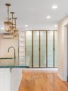 Plenty of shelving with glass doors