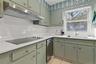 Kitchen with white subway tile backsplash