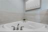 Jacuzzi tub in Primary bathroom
