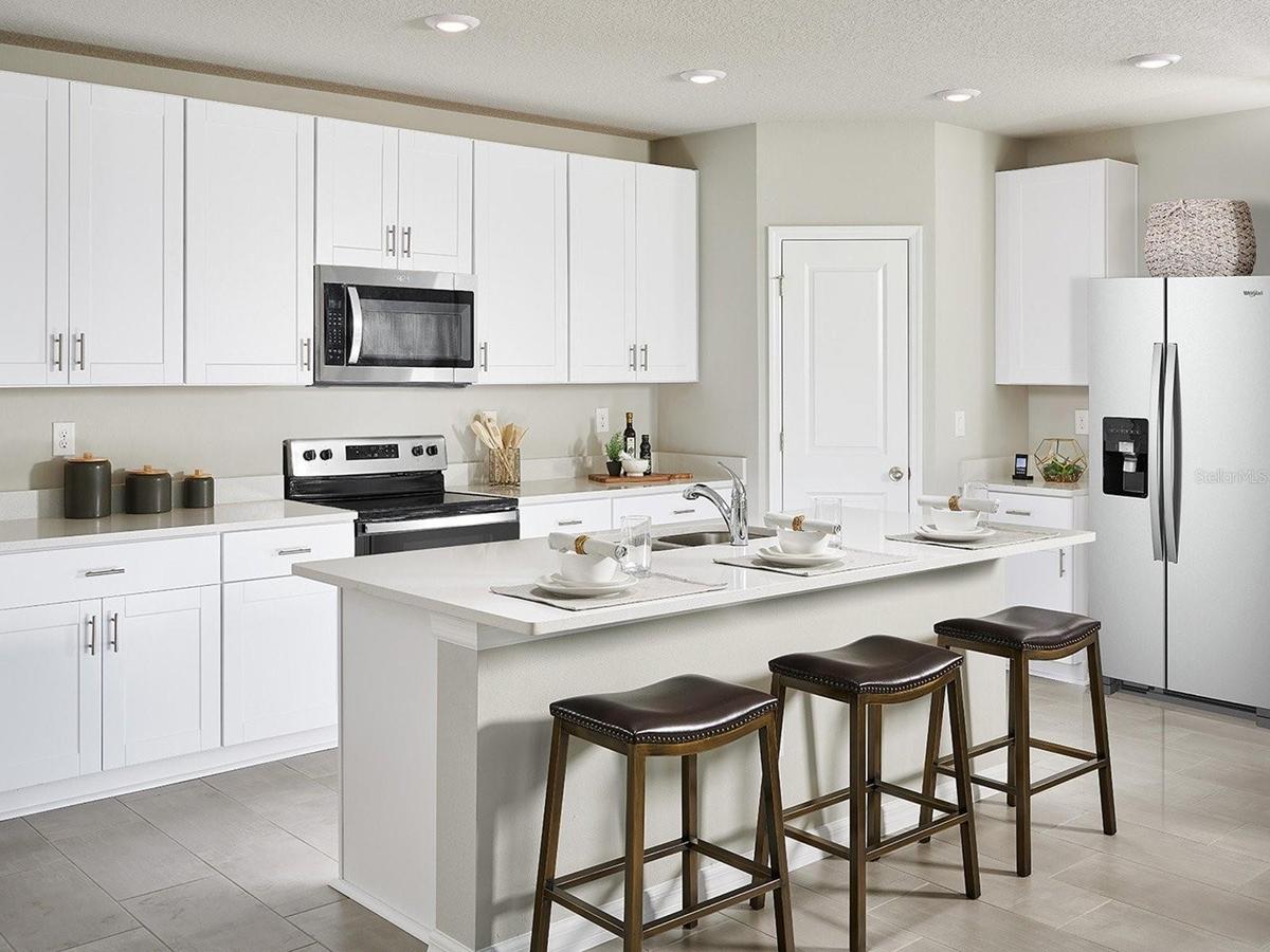Photo is not of the actual home, but is an inspirational photo of builder’s model home and may depict options, furnishings, and/or decorator features 