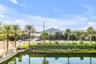 View from back patio of pond and patio