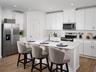 Photo is not of the actual home, but is an inspirational photo of builder’s model home and may depict options, furnishings, and/or decorator features 