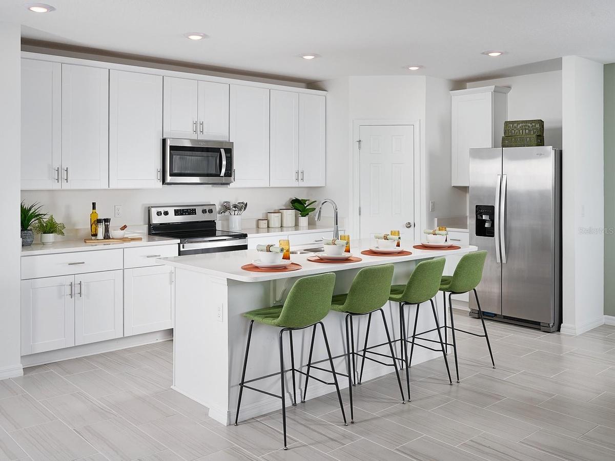 Photo is not of the actual home, but is an inspirational photo of builder’s model home and may depict options, furnishings, and/or decorator features 