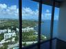 Floor-to-ceiling windows featuring panoramic water and coastal landscape exposures