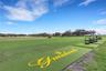Nearby are the golf practice areas like the driving range.