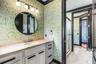 a private bathroom vanity area to the shared "J & J" bathroom.