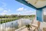 Back patio with pond and Marina view