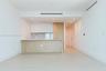 Kitchen featuring flat-panel cabinetry, light-toned wood-finish panels, stone-surface countertops, recessed ceiling lighting, and wood-finish flooring