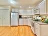 Kitchen with laundry area