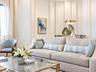 Vertical wall paneling featuring clean lines and a suspended circular metal light fixture