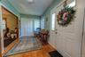 Entrance foyer with wall of closets!