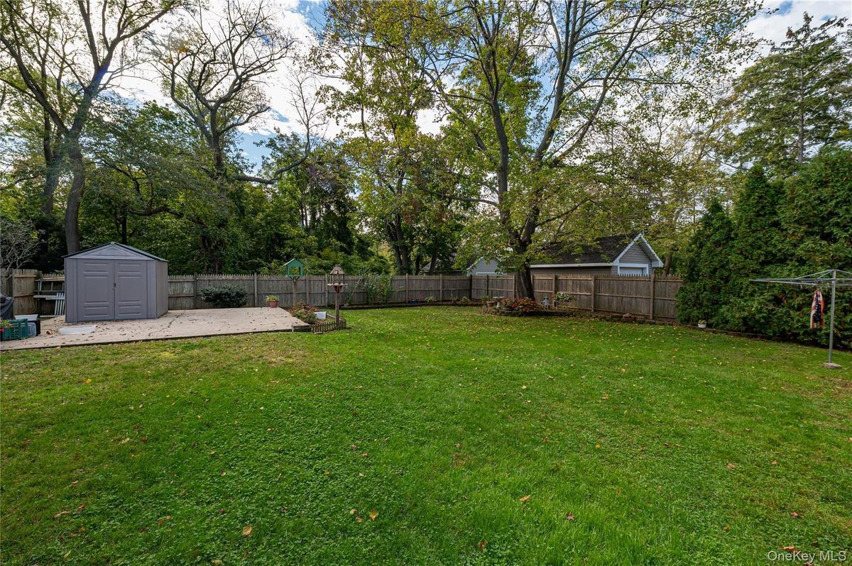 Shed is a gift. Sits atop a cement pad which was installed to accommodate a 2 car garage that was demolished in approximately 1986. Permit for structu