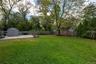 Shed is a gift. Sits atop a cement pad which was installed to accommodate a 2 car garage that was demolished in approximately 1986. Permit for structu