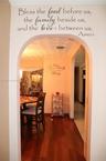 Architectural arched doorway featuring wood-finish flooring and textured ceiling detail