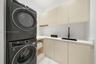 Luadry room with sink. Electrolux Washer/Dryer
