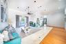 High ceilings featuring recessed lighting, custom-finished concrete flooring, integrated ceiling fan, and sliding glass doors leading to an outdoor sp