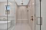 Oversized Walk-in Shower with Dual shower heads.