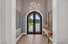 Custom made in Italy, 10' Impact Glass and Iron doors.