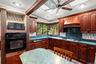 Eat in Kitchen with a water view and skylights