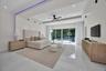 Tray ceiling featuring integrated LED lighting, polished tile flooring, recessed lighting, ceiling fan, and floor-to-ceiling sliding glass doors