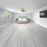 Spacious interior room featuring wood-finish flooring, recessed lighting, crown molding, a ceiling fan, and double panel doors