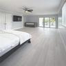 Interior space featuring wood-finish flooring, sliding glass doors, recessed lighting, a ceiling fan, and double-door closet cabinetry
