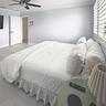 Neutral-toned room featuring wood-finish flooring, crown molding, a multi-blade ceiling fan, and horizontal window blinds