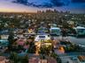 Waterfront property featuring a flat roof architectural design, multi-level terraces, private pool, and bulkhead dockage