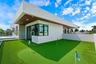 Contemporary rooftop terrace featuring a multi-hole putting green, synthetic turf surfacing, flat-roof architecture, recessed ceiling lighting, and fl