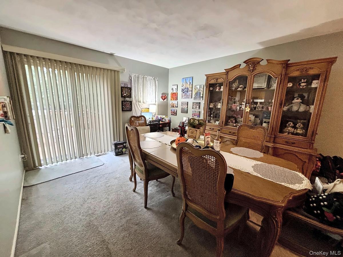 Formal Den (Currently Being Used As A Formal Dining Room.)
