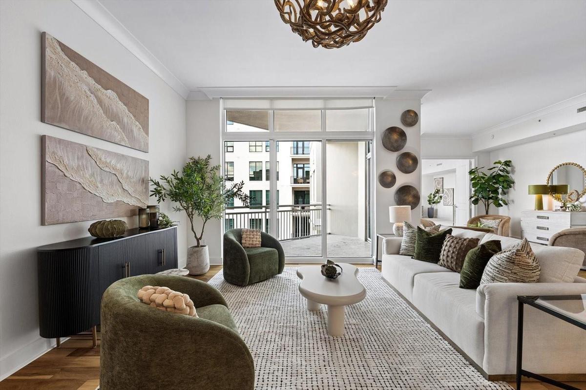 Living room with great natual light and motorized shades