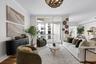 Living room with great natual light and motorized shades