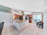 updated kitchen with granite countertops, stainless appliances, recessed lighting