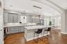Renovated Kitchen with Custom Cabinetry and Quartz Countertops
